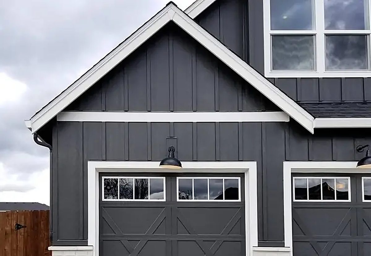 Dark board and batten fiber cement siding